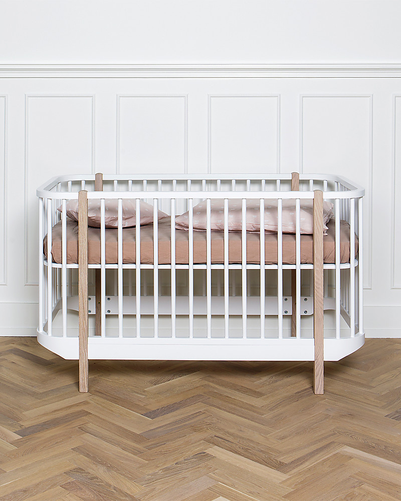 wood and white cot